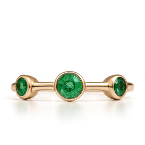 Minimal Three-Stone Emerald Ring