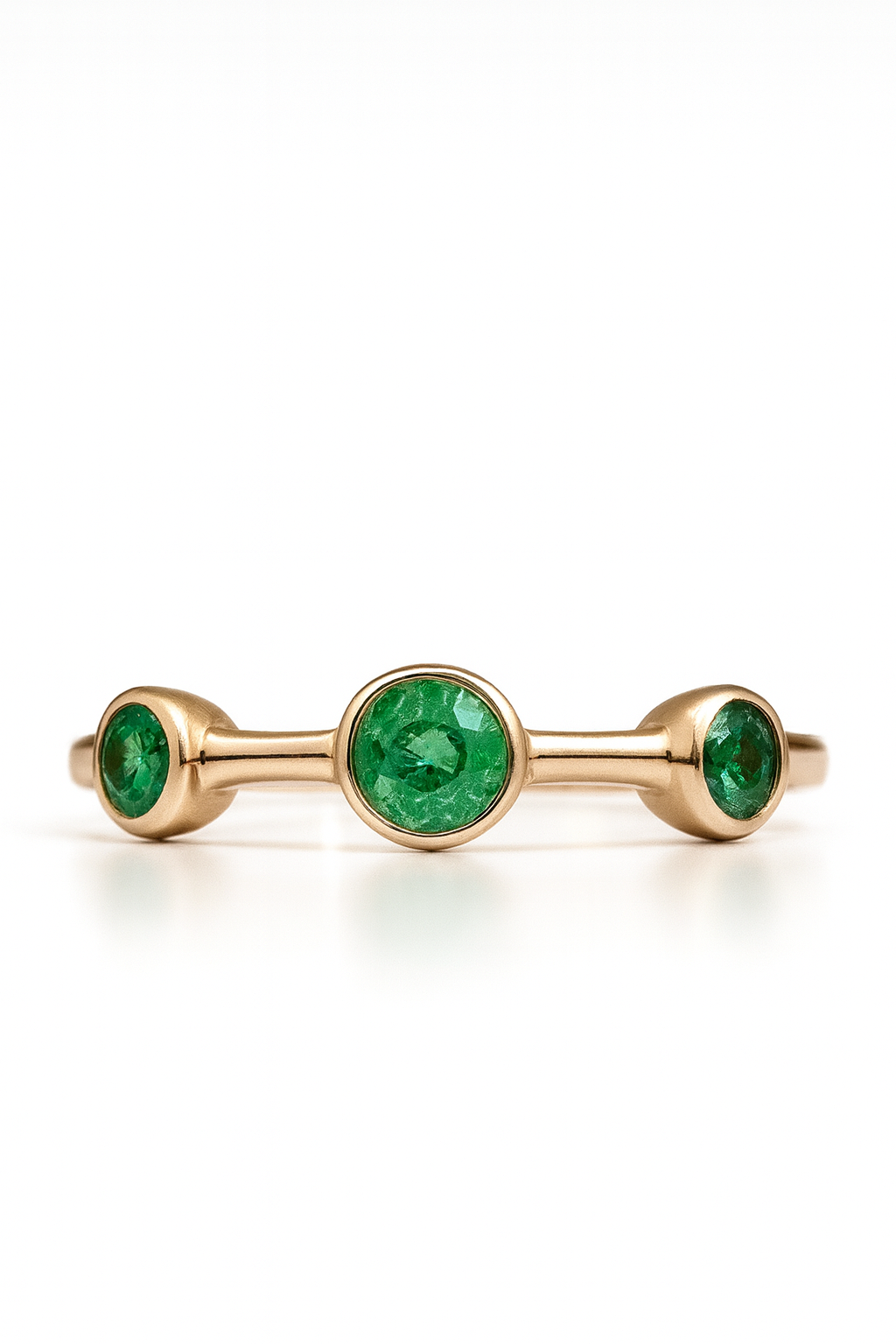 Minimal Three-Stone Emerald Ring